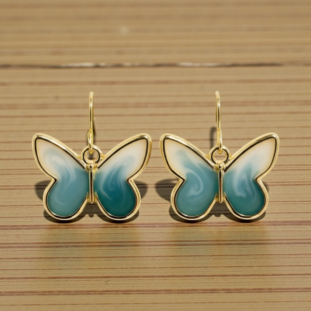 Teal & Cream Butterfly Earrings – Gold Framed Swirl Resin Dangles