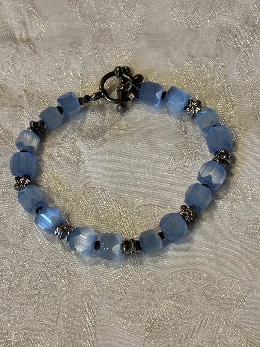 Upcycled Vintage Glass Bracelet, 7 Inch Blue Faceted Bead Bracelet with Metal Flower Spacers, Toggle Clasp
