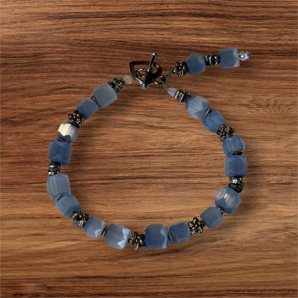 Upcycled Vintage Glass Bracelet, 7 Inch Blue Faceted Bead Bracelet with Metal Flower Spacers, Toggle Clasp