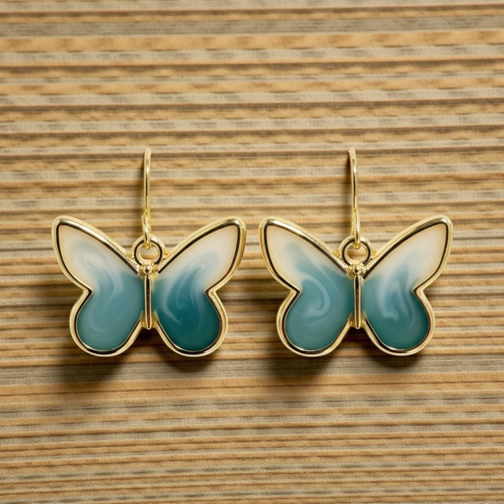 Teal & Cream Butterfly Earrings – Gold Framed Swirl Resin Dangles